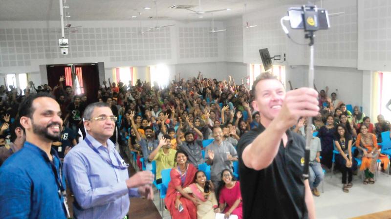 Former Australian cricketer Brett Lee takes a selfie with the students of National Institute of Speech and Hearing (NISH) at an event held to promote newborn hearing screening in the state on Monday. (Photo: A.V.MUZAFAR)