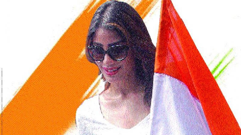 A file picture of Bengaluru girl Nicole Faria with the Indian tricolour used for representational  purposes only