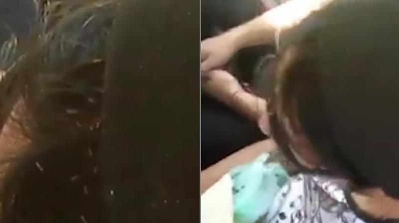 The footage was posted with a caption that read, When you travel by bus, watch out for who you are sitting next to, look why (Photo: Facebook)