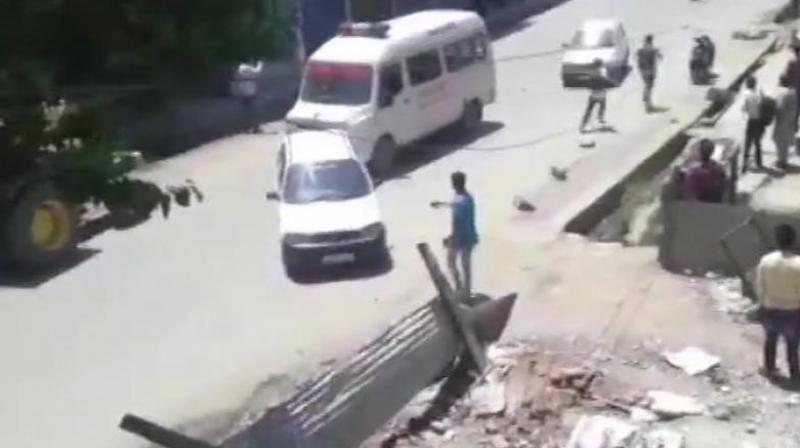 Militants hurled a grenade on security forces in Shopian town, resulting in injuries to at least 12 civilians and four cops, a police official said. (Photo: Twitter/ANI)