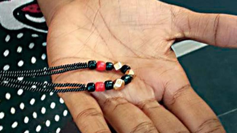 A view of the mangalsutra with the red coral bead which women are now crushing fearing that it would prove harmful to their husbands