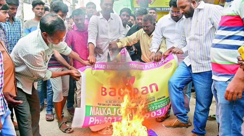 Residents and other parents protest in front of Bachpan School after Rachith drowned in an open sump at the school. (Photo: DC/File)