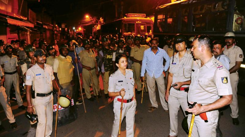 Cops in action during the violence in Belagavi on Wednesday.