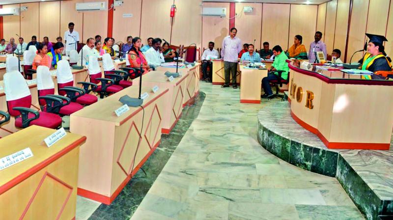 Empty chairs greet mayor P. Rajani Sesha Sai during the Budget meeting at the Council hall in Rajahmundry on Monday. TD corporators had staged a walkout. (Photo: DC)