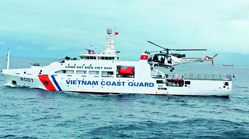 An Indian Coast Guard chopper lands on the Vietnamese Coast Guard ship as part of the first ever Indo-Vietnam Coast Guard Joint exercise conducted in the Bay of Bengal off Chennai on Thursday.