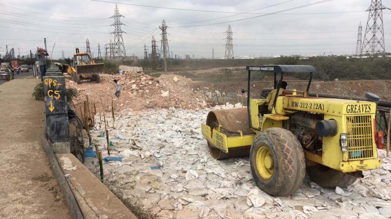 Chennai Petrolium Corporation Limited, lays anaccess road across the North Buckingham Canaal violating environmental norms. (Photo: DC)