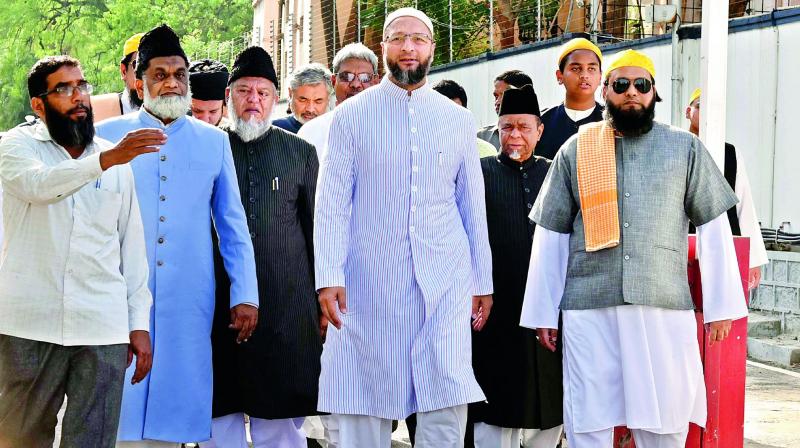 A delegation comprising 10 different Muslim organisations led by AIMIM president and Hyderabad MP Asaduddin Owaisi comes out of Raj Bhavan after submitting a memorandum to AP and TS Governor E.S.L. Narasimhan on Thursday.   (Photo:DC)