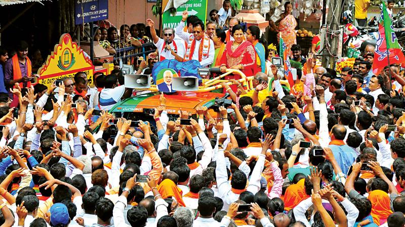 BJPs Bengaluru South candidate M. Krishnappa in a roadshow before filing papers on Thursday.  (Photo:DC)