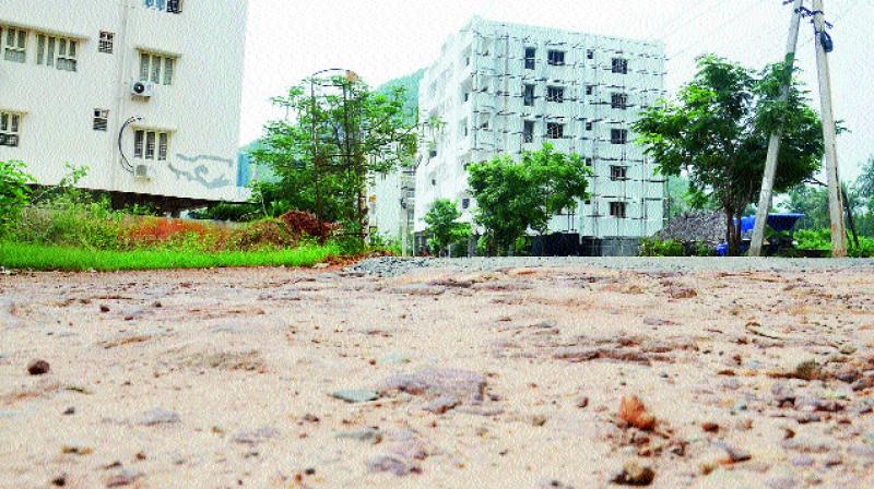 Damaged roads a curse to the residents of YLP Layout near Saagarnagar in Visakhapatnam. (Photo: DC)