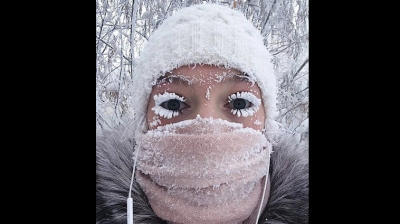 In this photo taken on Sunday, Jan. 14, 2018, Anastasia Gruzdeva poses for selfie as the Temperature dropped to about -50 degrees (-58 degrees Fahrenheit) in Yakutsk, Russia. (Photo: AP)