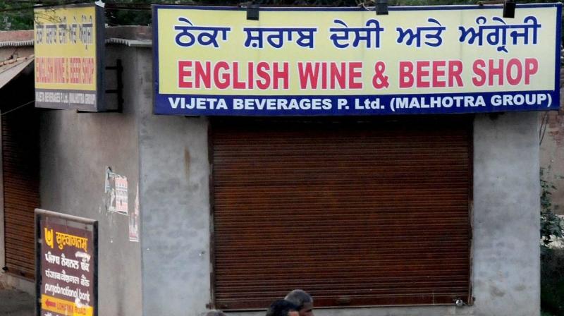 A closed liquor shop as the Supreme Court order to ban liquor vends located within 500 meters of Punjabs National and State Highways from April 1 in Amritsar. (Photo: PTI)