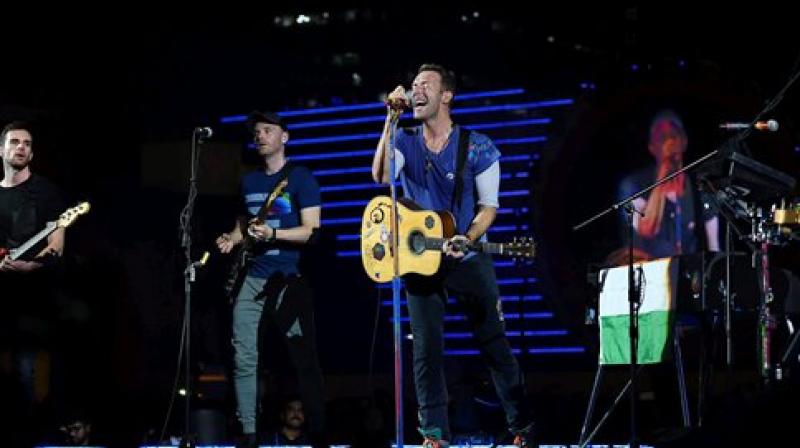 Chris Martin of British Band Coldplay performs during the Global Citizen concert. (Photo: PTI)
