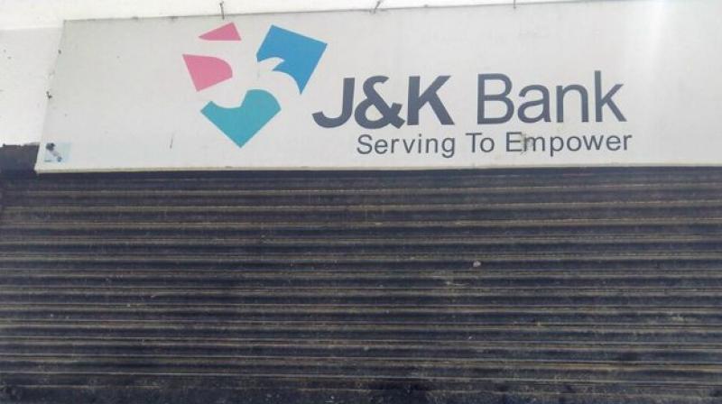A group of terrorists looted the Jammu and Kashmir Bank at Arwani Bijbehara in Anantnag district on Monday. (Photo: ANI/Twitter)