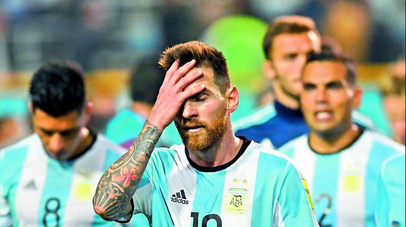 Lionel Messi of Argentina gestures as he walks off the ground at the end of the goalless World Cup qualifier football match against Peru in Buenos Aires, Argentina. (Photo: AFP)