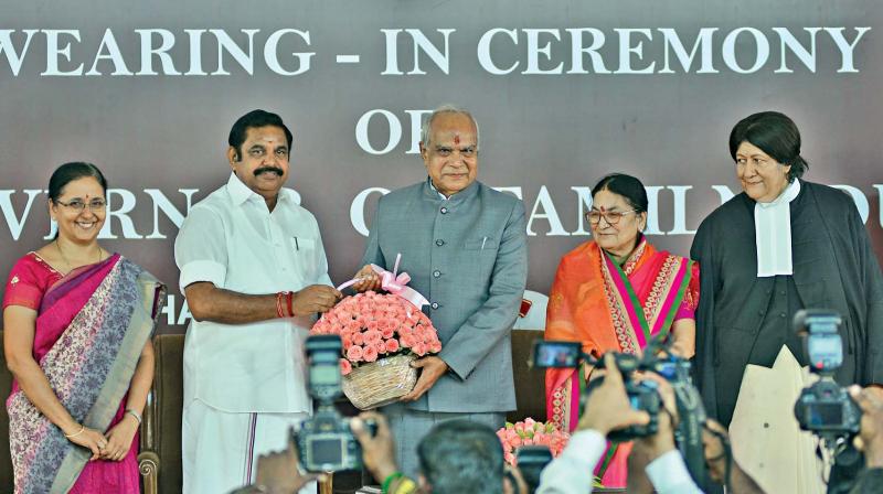 Chief Minister Edappadi K. Palaniswami greets Banwarilal Purohit who took oath as the new Governor of Tamil Nadu at Raj Bhavan on Friday. (Photo: DC)