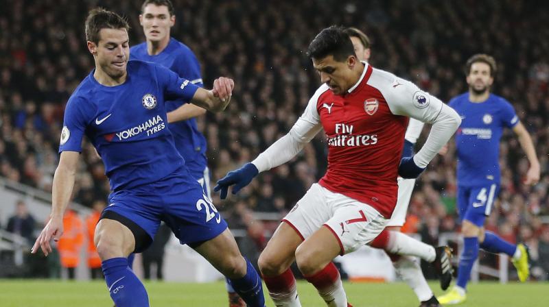 : Arsenal and Chelsea made a mockery of talk of player fatigue at the end of a festive slog of Premier League action as Hector Bellerins stoppage-time stunner earned the hosts a 2-2 draw in a scintillating derby on Wednesday.(Photo: AP)