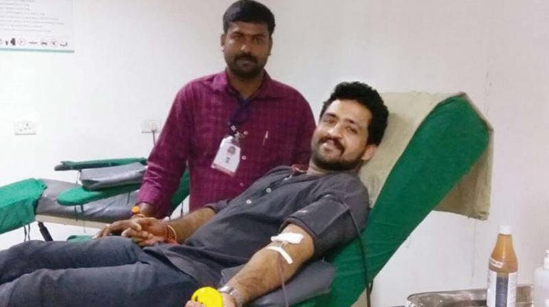 A donor donates blood to a blood bank in Kozhikode as part of the charity works of Gift of Heart group.