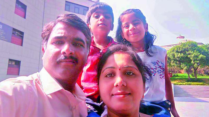 The accused Harinder with his wife and children.