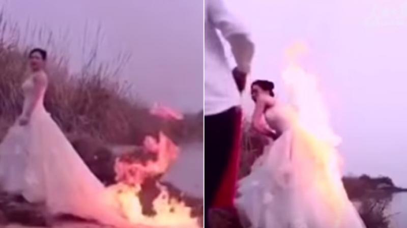 The video of the Chinese bride shows her photographer lighting the fire but things take a turn for the worse unlike what they expected. (Photo: Youtube)