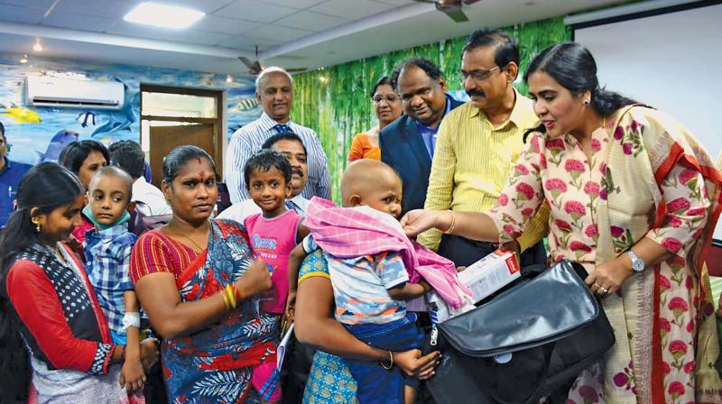 Doctors interacting with pediatric cancer survivors at Institute of Child Health (ICH) and Hospital for Children. (Image DC)