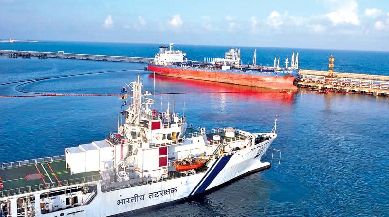 Pollution Control Vessel Samudra Paheredar cleaning the oil spilt by MT Coral Stars on Sunday. (Image DC)