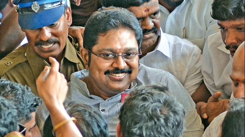 A happy Dhinakaran receives a rousing reception from party cadre as he arrives at Chennai airport on Saturday. (Photo: DC)