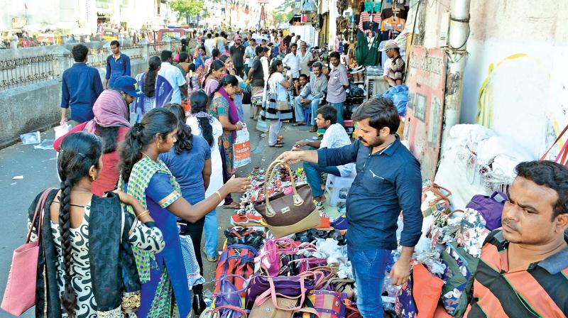 Businesses slowly resumes in T Nagar post Chennai Silks fire, as platform sellers and hawkers open their stalls on Saturday. (Photo: DC)
