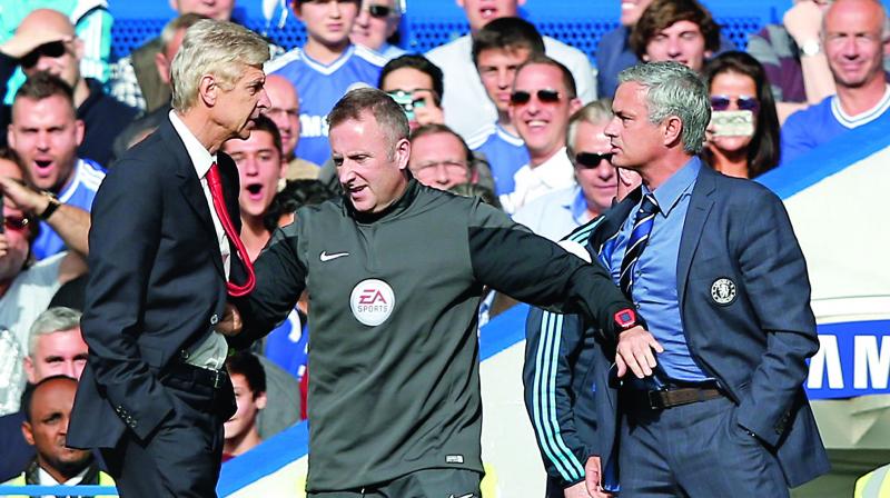 Arsenal manager Arsene Wenger (left) has never trumped Jose Mourinho in 13 competitive games since they first clashed back in 2004.