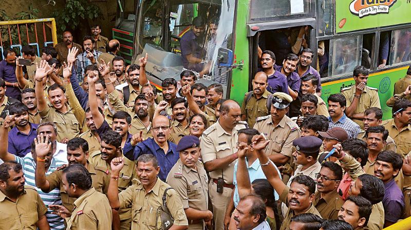 Shantinagar BMTC depot staff staged a half-day protest following a suicide attempt by a fellow employee alleging harassment by depot manager in Bengaluru on Tuesday 	(Photo:DC)