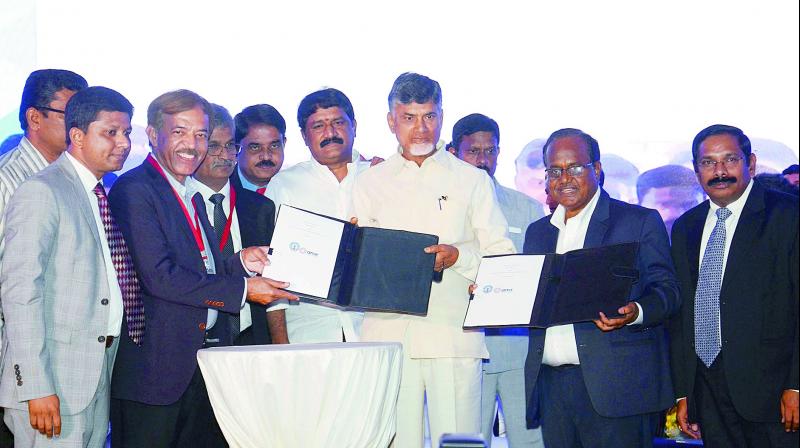 CEOs of various software companies sign an MoU with the state government in the presence of Chief Minister N. Chandrababu Naidu at the inauguration of Fin-Tech Tower in Visakhapatnam on Saturday. 	(Photo: DC)