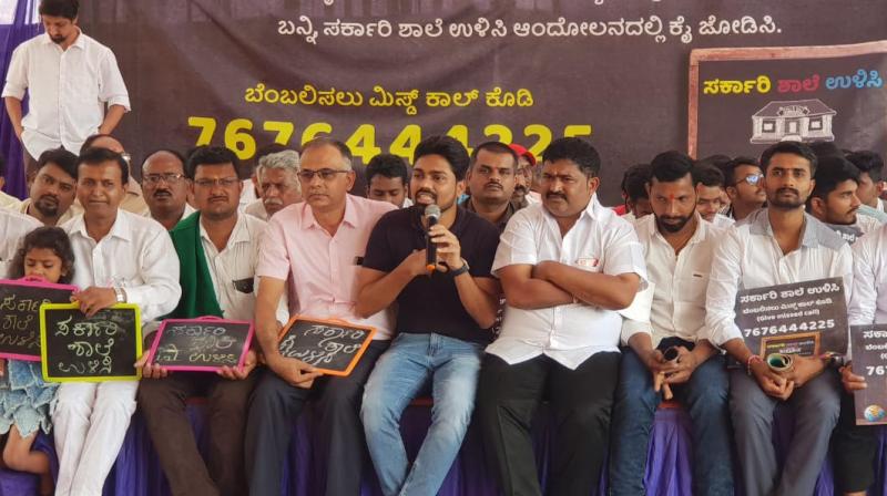 Activist Anil Shetty addressing the audience during the open discussion organised as part of #SaveGovtSchools campaign at Freedom Park.