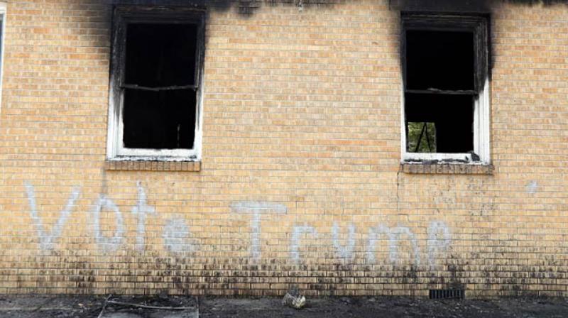 A Vote Trump graffiti was done on the exterior of an an African-American church in Mississippi. (Photo: AP)