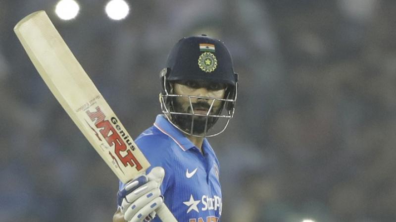 Virat Kohli is set to captain India for the first time in a major ICC event, and is fortunate to MS Dhoni have beside him, the calm and calculated wicketkeeper-batstman, who can seemingly win any game on his own and from any tough situation.(Photo: AFP)