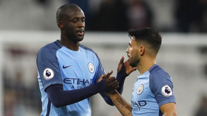 A flurry of new signings does not spell the end for long-time Manchester City players Sergio Aguero and Yaya Toure. (Photo: AP)