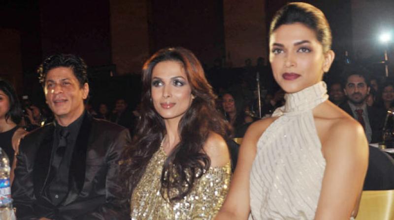 Shah Rukh Khan, Malaika Arora Khan and Deepika Padukone.