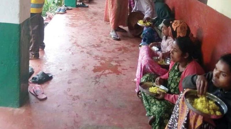 People rescued from rain-hit areas housed in a school near Madikeri.