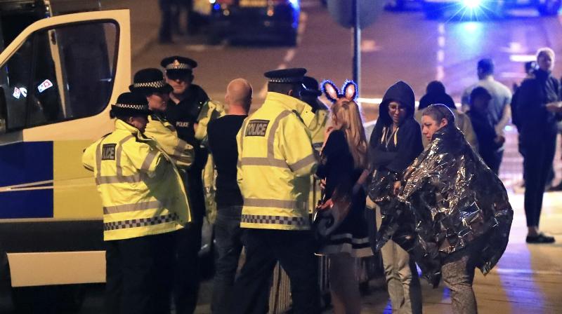 Emergency services work at Manchester Arena after reports of an explosion at the venue during an Ariana Grande gig in Manchester. (Photo: AP)