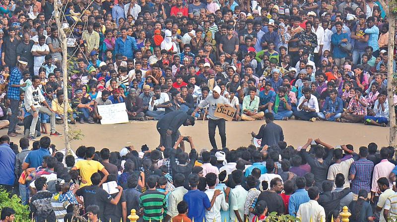 Young people organise a skit against PETA during the protest in Marina on Sunday. (Photo: DC)