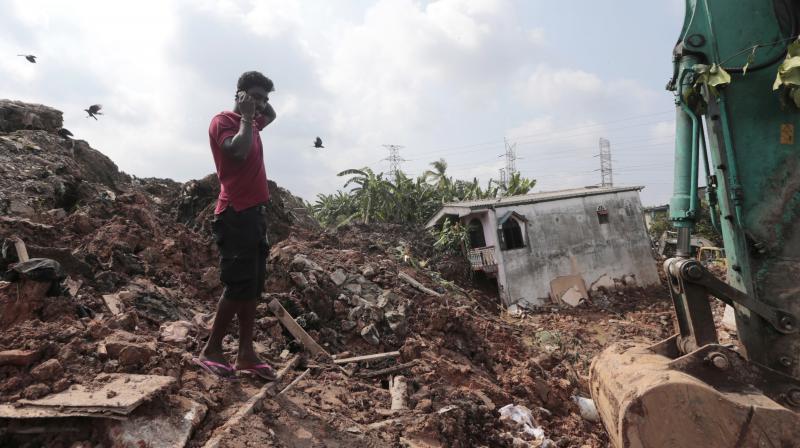 Sri Lanka: 19 killed in garbage dump collapse; PM issues apology