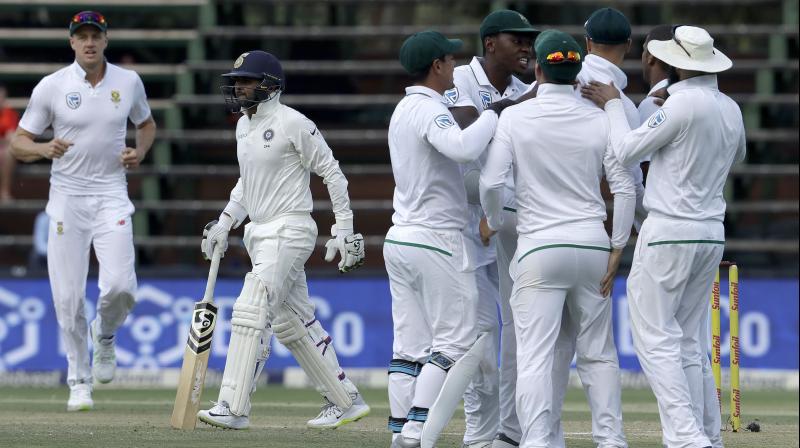 South Africa players celebrate the wicket of Parthiv Patel. (Photo: AP)