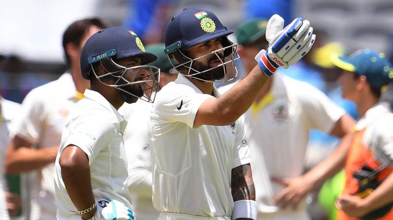 India captain Virat Kohli fell to a controversial catch after becoming the second-fastest batsman to 25 Test centuries on the third day of the second Test against Australia in Perth. (Photo: AFP)