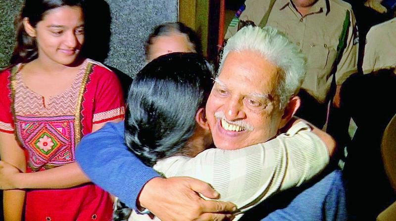 Varavara Rao greeting his family members after he was brought to the city by Pune Police on Thursday. (Photo: DC)