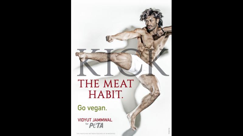 The campaign seems him appearing next to the words \Kick the Meat Habit. Go Vegan.\