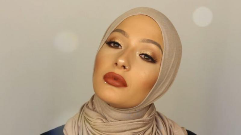 Nura Afia will soon be featured in commercials and billboards of the leading U.S. cosmetics brand CoverGirl. (Credit: YouTube)