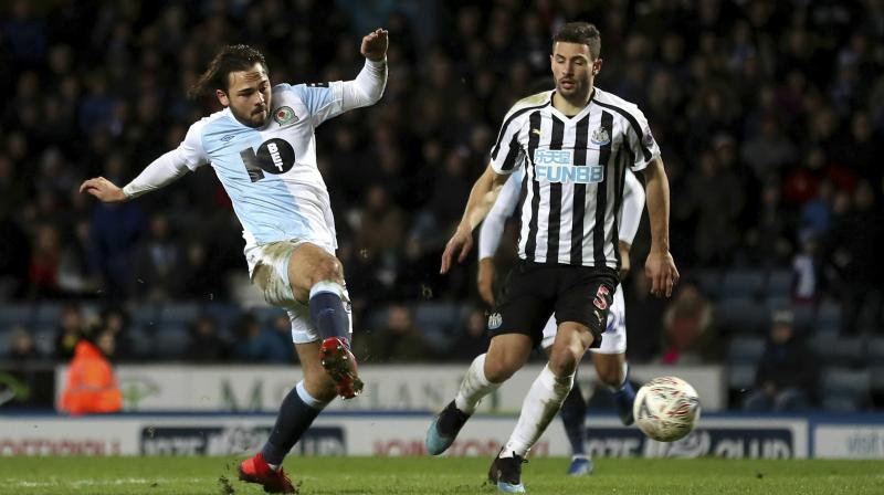 Newcastle fans, who had seen their side narrowly escape defeat in the home match with Championship Blackburn, were given some respite from their top-flight struggles with a replay win against their fellow six-time FA Cup winners at Ewood Park. (Photo: AP)