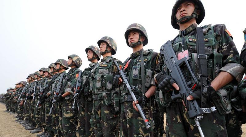 Published on Tuesday, the Pentagon report estimated that China spent $180 billion last year on its military -- the worlds largest -- a figure well over the countrys official $140 billion defence budget. (Photo: AFP)