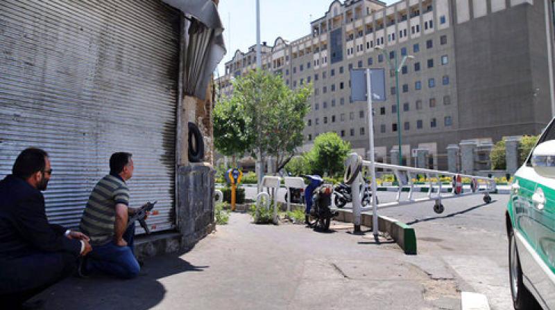 The Tehran Security Council has convened an emergency meeting after two terror attacks were reported on the Iranian Parliament and Imam Khomeini Mausoleum respectively on Wednesday. (Photo: AP)