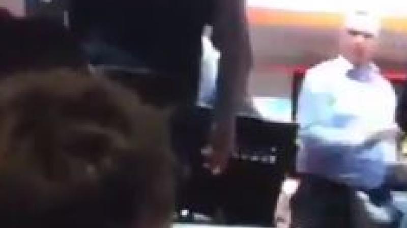The restaurant staff is seen fending off the attackers in the video as they hit the customers with weapons. (Photo: Videograb)