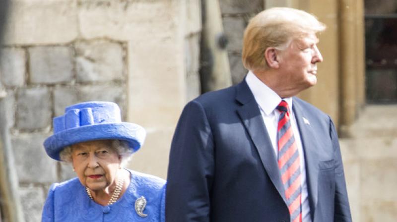 Trumps visit to Windsor Castle further caused controversy when he broke royal protocol by walking in front of the Queen as he discussed the Guard of Honour. (Photo: AP)
