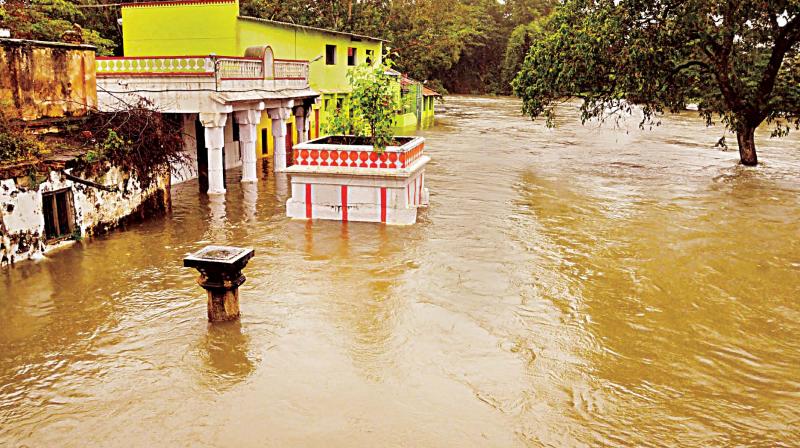 As one lakh cusecs water discharged from KRS, many areas in Srirangapatna taluk were flooded in Mysuru on Tuesday (Photo: KRS)